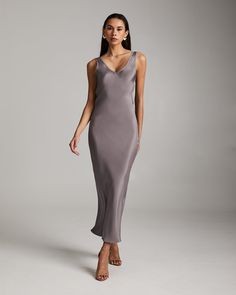 Bias cut silk crepe slip elegantly drapes on the body. Featuring an elongating V Neck at the front and back. 100% silk crepe Model is 5'10" and wearing a size S Product Care: Dry Clean Only Silk V-neck Midi Dress For Gala, Fitted V-neck Slip Dress For Gala, V-neck Bias Cut Slip Dress For Gala, Pre-draped Silk Slip Dress For Gala, Bias Cut V-neck Slip Dress For Gala, Sleek Silk V-neck Dress For Formal Occasions, Sleek Silk Dress With Bias Cut V-neck, Sleek Modal Satin Gala Dress, Sleek Modal Satin Dress For Gala