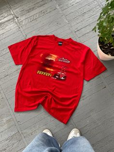 FOLLOW MY SHOP TO CHECK DAILY UPDATES & PRICE DROPS Vintage 90's Ferrari Tee Shirt in Red Short sleeve graphic tee shirt with autograph by Michael Shumacher on the left shoulder Size XL P2P - 23'' Length - 31.5'' Jacket is in very good pre-owned condition. Please check pictures for more information on the product Shipping options: - standard shipping in 7-15 days - priority in 3-5 business days (price will be more) Check out my other items & follow - new arrivals every week! If you have any ques Red Crew Neck Top With Graphic Print, Red Graphic Tee Shirt With Crew Neck, Red Crew Neck Graphic Tee Shirt, Red Crew Neck Top With Relaxed Fit, Red Relaxed Fit Crew Neck Top, Red Crew Neck Shirt For Streetwear, Red Crew Neck Shirt With Relaxed Fit, Red Relaxed Fit Shirt With Crew Neck, Red Relaxed Fit Crew Neck Shirt