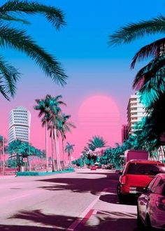 palm trees line the street in front of tall buildings and skyscrapers on a pink sky day