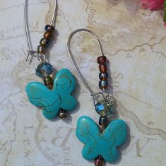 Turquoise Butterfly With Glass Beads Drop Earrings. One Of A Kind. Turquoise Earrings With Colorful Czech Glass Beads, Turquoise Beaded Earrings With Colorful Czech Glass, Handmade Turquoise Beaded Earrings With Czech Glass, Handmade Turquoise Butterfly Jewelry, Turquoise Beaded Earrings With Czech Glass, Turquoise Wire Wrapped Czech Glass Earrings, Turquoise Wire Wrapped Beaded Earrings As Gift, Turquoise Beaded Earrings In Czech Glass, Turquoise Czech Glass Beaded Earrings For Pierced Ears