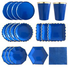 a set of blue plates, cups and napkins