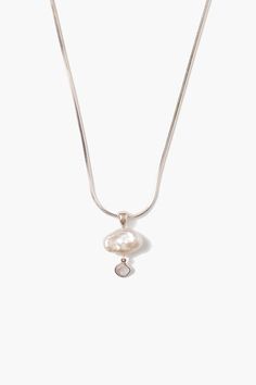 An elevated take on the classic pearl. This sterling silver necklace features a white keshi pearl chip with a silver wrapped sliced diamond drop. Style alone or pair with dainty pearl styles to complete the look. Sterling silver. Diamond Wt.: .02ct 16" - 18" adjustable. Handmade in Vietnam. Diamond Necklace Silver, Chan Luu Necklace, Pearl And Diamond Necklace, Gold Wrap, Charm Necklace Silver, Diamond Charm, Keshi Pearls, Mom Necklace, Chan Luu