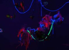 an artistic display with neon colors and lights