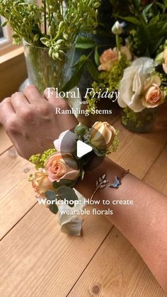 flowers are arranged in vases on a table with the words floral friday hanging from them