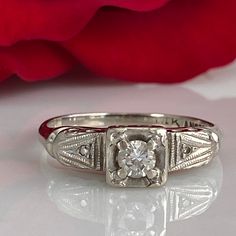 Details: Sweet classic Art Deco diamond ring--this one would make a great engagement ring or just a sweet ring to add to a collection. Would also be a great pinky ring! Please ask all necessary questions prior to placing an order. Measurements: The size is 4 1/2 US, and can be sized for a fee. Condition: The overall all condition of this ring is very good. Promise Ring With Single Emerald Cut Diamond, Emerald Cut Single Diamond Ring For Promise, Emerald Cut Single Diamond Promise Ring, Promise Diamond Ring With Single Emerald Cut Diamond, Promise Diamond Ring With Single Emerald Cut, Emerald Cut Diamond Promise Ring With Single Diamond, Fine Jewelry For Wedding With Single Diamond, Classic Promise Rings With Round Band, Elegant Single Diamond Cluster Ring In White Gold