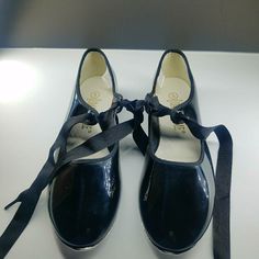 Never Worn Tap Dance Shoes Features: Patent Upper With Flexible Manmade Outsole Adjustable Tie For Proper Fit. Non-slip Ballet Dance Shoes With Closed Toe, Non-slip Round Toe Dance Shoes For Dance Class, Non-slip Ballet Dance Shoes With Round Toe, Round Toe Dance Shoes With Rubber Sole, Round Toe Rubber Sole Dance Shoes, Ballet Dance Shoes With Round Toe, Black Dance Shoes With Rubber Sole And Round Toe, Spring Ballet Dance Shoes With Round Toe, Black Closed Toe Dance Shoes