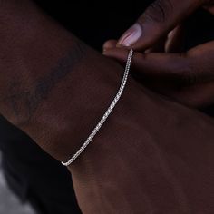 Introducing the Palm Chain Bracelet in White Gold, the 2mm version. This versatile 14k White Gold bracelet features a braided rope design that will instantly level up your look. This piece is ideal for stacking and accessorizing any outfit- day or night. Pair it with the Palm Chain in 2mm for the perfect matching set! This product is guaranteed for life – GLD will repair or replace the item should you experience any defects in craftsmanship or breakage. Specifications - Width: 2mm - Length: 6", White Gold Bracelet, Braided Rope, Rope Design, Vermeil Jewelry, Custom Earrings, Gold Plated Bracelets, Pendant Bracelet, Drop Necklace, The Palm