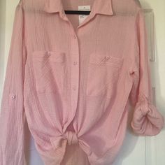 This Nwt Beautiful Blouse By Sanctuary Is A Size Small. It Has A Slight Pattern And Has An Almost Gauze Feel. It Is Lightweight And Perfect For Summer. Can Be Tied Or Worn Down And Sleeves Can Be Rolled And Buttoned. Purchased At Nordstrom. Feminine Buttoned Tops For Beach, Feminine Buttoned Tops For The Beach, Casual Pink Blouse With Button Closure, Pink Tops With Button Closure For Day Out, Pink Buttoned Beach Blouse, Chic Long Sleeve Peach Top, Chic Peach Long Sleeve Tops, Feminine Shirt With Button Closure For Day Out, Pink Blouse With Buttons For The Beach