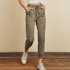 Jogger Pants With Drawstring Waist & Elastic Cuffs Detail. Color: Light Olive Fabric Content: 100% Tencel Casual Full-length Joggers With Drawstring, Spring Ankle-length Drawstring Joggers, Sporty Ankle-length Joggers With Drawstring, Full-length Cotton Joggers With Elastic Waistband, Solid Full-length Joggers With Drawstring, Tan Jumpsuit, Harem Pants Jumpsuit, Olive Fabric, Striped Wide Leg Trousers