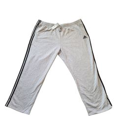 Elevate Your Activewear Wardrobe With These Adidas Essentials Fleece 3-Stripes Sweatpants. The Gray Pants Are Designed With A Regular Size Fit And Made From Comfortable Fleece Fabric. The Iconic 3-Stripes Run Down The Sides, Giving The Pants A Touch Of Sporty Style. Perfect For Any Occasion, These Sweatpants Are Ideal For A Relaxed Day At Home Or For A Quick Workout. The Pants Come With A Drawcord On The Elastic Waist, Ensuring A Secure And Comfortable Fit. The Adidas Essentials Fleece 3-Stripes Adidas Relaxed Fit Sweatpants With Three Stripes, Relaxed Fit Pants With Three Stripes For Loungewear, Sportswear Sweatpants With Three Stripes For Loungewear, Adidas Sportswear Pants For Loungewear, Adidas Three Stripes Sweatpants For Loungewear, Adidas Three Stripes Joggers For Loungewear, Adidas Three Stripes Pants For Loungewear, Adidas Three Stripes Loungewear Pants, Adidas Loungewear Pants With Three Stripes