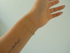 **ZOOM for better detail *Water safe Simply elegant! Dainty, delicate, and perfect for everyday wear. Wear it as a wrap bracelet, a long layer necklace, or a double strand short necklace! 🌟 FEATURES: -14k Gold filled chain with tiny Sterling Silver accents -14k Gold filled clasp *Also available in 14k Rose Gold! MEASUREMENTS: 36 inches with 2 inch extender. Handmade in Los Angeles. Necklace Real Gold, Real Gold Bracelet, Real Gold Necklace, Gold Body Chain, Real Gold Jewelry, Necklace And Bracelet, Dainty Bracelets, Multi Strand Necklace, Short Necklace