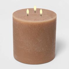 a candle with three candles on top of it