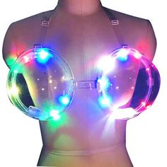 a female mannequin with two lights on it's chest and one light up in the shape of a ball