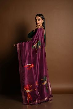 Featuring intricate Zari abstract motifs, this luxurious handloom silk saree in wine purple is perfect for making a sophisticated statement. Ideal for special occasions. Elegant Purple Chanderi Pre-draped Saree, Festive Purple Tussar Silk Pre-draped Saree, Purple Handloom Chanderi Pre-draped Saree, Purple Handloom Pre-draped Saree For Diwali, Elegant Cotton Silk Saree In Purple, Unstitched Purple Cotton Silk Saree, Purple Unstitched Cotton Silk Saree, Purple Cotton Silk Saree With Cutdana, Festive Purple Cotton Silk Saree