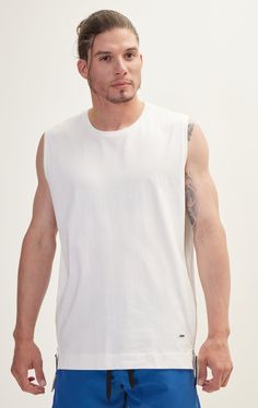 Elevate your summer wardrobe with our Men's Zero Sleeve Cotton T-Shirt. Crafted from soft, breathable cotton, this sleeveless tee is perfect for keeping cool on hot days. Its relaxed fit and classic crew neckline ensure comfort and versatility, making it ideal for everything from workouts to casual outings. Pair it with shorts or jeans for a laid-back look that doesn't compromise on style. SIZE + FIT Tailored fit, to find your correct size use the ''what's my size '' button. COMPOSITION 100% Cotton Made in Turkey CARE Machine wash cold with similar colors STYLE #: 8213 Sleeveless Tee, My Size, Hot Days, White Tshirt, Summer Wardrobe, Sleeve Cotton, Crew Neckline, Cotton T Shirt, Cotton Tshirt