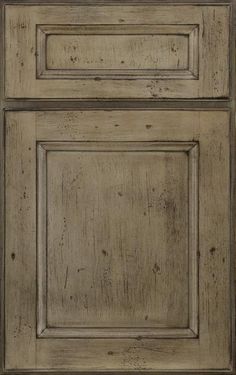 an old wooden cabinet with two doors and one drawer on the bottom side, in whitewash