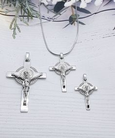 This Spiritual Crucifix of Saint Benedict Double Sided made from high quality sterling silver 925 its the perfect gift for anyone and excellent for everyday wear. Cubic Zirconia Crucifix size :5.5cm×3cm(with a hook) Crucifix size :3.5cm×2cm (with a hook) Crucifix size :3cm×1.80cm (with a hook) Chain length : 45cm or 40 cm Sterling Silver Crucifix Jewelry As Gift, Personalized Silver Crucifix Jewelry, Silver Sterling Silver Crucifix Necklace, Nickel-free Sterling Silver Crucifix Jewelry, Silver 925 Stamped Crucifix Jewelry, Silver Crucifix Necklace For Anniversary, White Gold Sterling Silver Crucifix Jewelry, St Benedict Cross, St Benedict