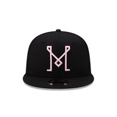 a black and pink hat with the letter m on it