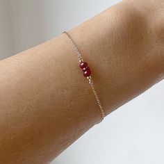 "Our genuine beaded ruby bracelet is also the July birthstone bracelet.  Ruby birthstone beads adorn this dainty minimalist, simple chain bracelet on a choice of gold filled, 14k gold, rose gold filled, or sterling silver chain. It is the perfect everyday bracelet or would make a special anniversary, birthday, bridesmaid, or wedding gift. This bracelet looks great layered with other bracelets or perfect by itself. We have birthstones and gemstones for every month.  Sizing: 6\"- XXS/XS,  6.5\"/S, Dainty Faceted Beaded Bracelets For Everyday Wear, Dainty Faceted Everyday Bracelets, Dainty Faceted Bracelet For Everyday, Dainty Everyday Faceted Bracelets, Dainty Faceted Everyday Bracelet, Dainty 14k Gold Filled Birthstone Bracelets, Dainty Everyday Birthstone Bracelets, Minimalist Faceted Bracelets, Minimalist 14k Gold Filled Bracelets With Birthstone