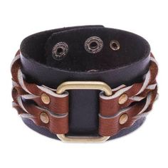 By Thailand's Nueng Pakdee this leather bracelet is masterfully handcrafted. A squared ring of antiqued brass links two handsome braids that surround the smooth leather wristband. Vintage Leather Bracelet Wristband, Vintage Leather Wristband Bracelet, Brown Leather Bracelets With Brass Hardware, Gold Vintage Leather Bracelet, Adjustable Brown Metal Cuff Bracelet, Adjustable Rectangular Leather Wristband, Adjustable Leather Rectangular Wristband, Adjustable Rectangular Jewelry With Leather Strap, Brown Leather Rectangular Bracelet