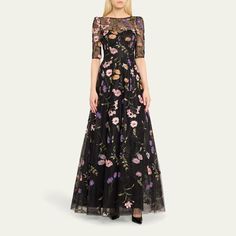 Rickie Freeman for Teri Jon tulle gown with beaded floral embroidery High neckline; sweetheart illusion Elbow sleeves Full length A-line silhouette Invisible back zipper Polyester Lining: Polyester Dry clean Imported