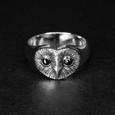 Glowing eyes in the dark... THIS RING: Sterling Silver 925.  Moderate weight. Hallmarked Australian silver, made to last forever. Original hand-carved design by Aaron. Embedded with two Onyx gemstones. Owl face is 15mm width x 11mm length. OUR RINGS: If your ring size isn't listed, please leave a note in checkout and we will make it accordingly! Want to engrave it? Send us a message! Engravings can start from $20. Each piece comes boxed and gift-wrapped. Handmade in Sydney, Australia. Glowing Eyes In The Dark, Eyes In The Dark, Owl Face, Lapis Lazuli Blue, Sterling Silver Owl, Owl Ring, Onyx Gemstone, Jewelry Inspo, Signet Ring