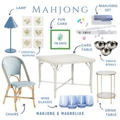 a white table with blue chairs and other items labeled in english, including lamp, wall hangings, wine glasses, napkins, glass holders, etc