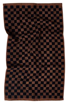 a black and brown checkered blanket on a white background