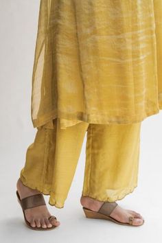 Shop for Nirjara Yellow Tissue Silk Hazrat Kurta And Palazzo Set for Women Online at Aza Fashions Unstitched Silk Kurta For Summer, Summer Straight Kurta In Raw Silk, Summer Raw Silk Straight Kurta, Straight Kurta With Sheer Dupatta For Summer, Summer Straight Kurta With Sheer Dupatta, Designer Cotton Silk Kurta For Summer, Summer Designer Cotton Silk Kurta, Summer Designer Wear Cotton Silk Kurta, Summer Chanderi Kurta With Sheer Dupatta