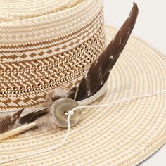 The Batterson Straw Hat is crafted with a firm finish from high-quality 100% Shantung straw. Unique, lightweight and statement-making, it has a 3 1/2” oval gambler crown and a 3” flat brim, complemented by a cotton cord hat band with removable feather detail and a genuine leather sweatband for a time-tested fit and all-day comfort. Handmade in the U.S.A. with the finest construction and materials, our straw hats are made to stand the test of time. 3 1/2" Oval Gambler Crown 3” Flat Brim Cotton Co Modern Cowboy, Stetson Hat, Flat Brim Hat, Large Feathers, Casual Bottoms, Straw Hats, Western Hats, Cowgirl Hats, Natural Tan