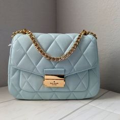 Nwt Kate Spade Carey Small Flap Chain Shoulder Bag Crossbody In Turquoise. Product Details Measurements 9.4" W X 6.2" H X 3" D Features Strap Drop: 20.5'' On Hardware Logo Closure Type: Flap With Push Lock Closure Dust Bag Included: No Interior: Back Zip Pocket Exterior: Front Slip & Back Zip Pocket Materials Quilted Leather Lining: Two Way Spade Jacquard Lining Quilted Leather Handbag, Hardware Logo, Kate Spade Purse, Kate Spade Handbags, Chain Shoulder Bag, Turquoise Color, Quilted Leather, Girls Fashion, Kate Spade Bag