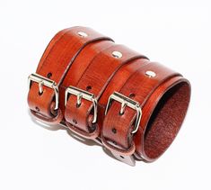 Unique brown leather bracelet! Very comfortable & easy to wear. Size: Wirst size: 6-8.5 inches(16-22cm) Width: 3.5 inches (9 cm) Color: brown. Material: genuine leather(leather is produced in Italy). If you have any questions please write! Punk Leather Wristband, Punk Style Leather Wristband As Gift, Brown Punk Leather Bracelet For Gift, Punk Leather Cuff Wristband, Punk Leather Wristband Gift, Punk Style Leather Cuff Bracelet As Gift, Punk Leather Cuff Bracelet As Gift, Mens Cuff, Brown Leather Bracelet