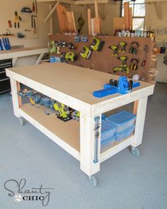 a workbench with tools on it in a garage