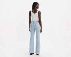 Our 726 High-Rise Flares are designed with a slim fit through your hip and thigh before flaring at the knee. Part of our signature ‘Lot 700’ fits, these jeans are designed to flatter;all day, every day. For those days when skinny jeans won't do Features a waist-defining high rise Finished with a flared leg Authentic denim character enhanced with supersoft stretch. For jeans that'll leave you starry-eyed. That's Levi's® Stellar Stretch. Thanks to excellent built-in recovery, they champion your cu Fitted Levi's Jeans With Five Pockets, Fitted Levi's Jeans, Levi's Fitted Flare Casual Jeans, Levi's Fitted Casual Flare Jeans, Casual Fitted Levi's Flare Jeans, Levi's Mid-rise Fitted Flare Jeans, Trendy Fitted Levi's Flare Jeans, Levi's Fitted Denim Flare Jeans, Fitted Levi's Jeans With Standard Cut Leg