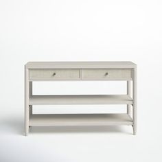 a white table with two drawers on one side and an open shelf on the other