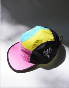 Our multi-coloured 5 panel cap, 100% polyester, elastic adjustment on back. On Back, Multi Color, Elastic, Color