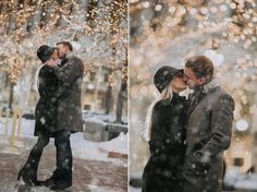 a man and woman kissing in the snow with christmas lights on the trees behind them