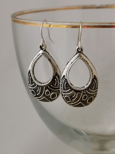 Antique silver style drop earrings. Silver plated, nickel free, hypoallergenic hooks. Boho earrings. Aztec silver earrings. Silver loop drop earrings. Antique Silver Drop Earrings, Antique Silver Drop Earrings With Ear Wire, Nickel-free Metal Drop Hoop Earrings, Nickel-free Drop Metal Earrings, Silver Teardrop Hoop Earrings With French Hook, Silver Sterling Hoop Earrings With French Hook, Minimalist Nickel-free Silver Teardrop Earrings, Metal Drop Hoop Earrings With Ear Wire, Metal Dangle Hoop Earrings With French Hook