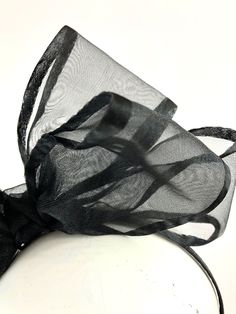 Black bow Fascinator - Bow Wedding Headpiece -chiffon and satin bow- Kentucky derby- Big bow Headband Hi, This triple bow headband has a handmade 4 inch chiffon with black satin edge. 10 inches long. It's sprayed with stiffener to hold its shape. Colors: Black Navy It's all placed on a 1/8 inch covered headband. This covered headband fits any head size and very comfortable. Plus no headaches! Pick a headband that matches Your hair color so it blends in. Light weight! For all ages...5 to 85 I am Bow Fascinator, Headband Fits, Big Bow Headband, Bow Wedding, Perfect 10, Wedding Bows, Big Bow, Wedding Headpiece, Big Bows