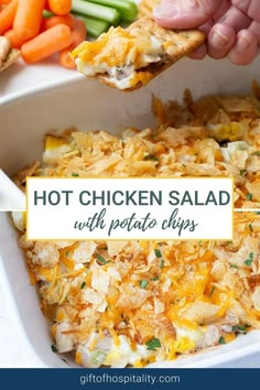 chicken salad with potato chips and carrots in a casserole dish on a plate