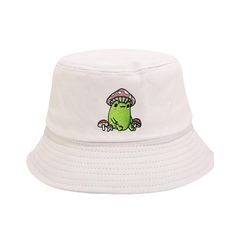 PRICES MAY VARY. 【Find Your Style】: Cute aesthetic frog with mushrooms bucket hat. This fishing hat is really special thanks to an adorable froggy with mushroom hat and surrounded by cute small mushrooms are embroidered on front of the beige fisherman sun cap. Makes a unique gift idea for anybody who loves nature, gardening, frog and froggie lover, toad fan, cottagecore aesthetic lover. Fun and cool, great for partying and going out! 【Features】: Made of high quality cotton and Polyester. This bu Green Bucket Hat For Streetwear, Green Bucket Hat For Summer Streetwear, Green Short Brim Bucket Hat For Streetwear, Casual Green Bucket Hat For Streetwear, White Wide Brim Bucket Hat, Cute Bucket Hat For Outdoor, Cute Outdoor Bucket Hat, Novelty Spring Bucket Hat, Spring Novelty Bucket Hat