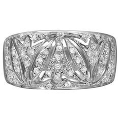 a white gold ring with diamonds in the center and an intricate design on it's side