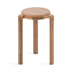 a small wooden stool sitting on top of a white floor