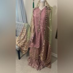 Two Color Beautiful Delicate Mehndi Dress With Gold And Pearls Work On It Silk And Organza Material.. Bridal 3 Pice Small Size Length Top Is 34 With Inner Pice 47 Bust 41 Shoulder 14 Bottom Garrha Pant Length42 Waste With Elastic 15 Pancha 35 Duptta 3 Meters Gold And Pearls, Organza Material, Mehndi Dress, Green Silk, Pink And Green, Pink Ladies, Wedding Dresses, Elastic, Silk