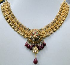 "Vintage antique 22 ct solid gold, Diamond necklace. Fully detailed handcrafted set with Diamonds ,attached genuine Ruby gemstones drops. Center Floral design deorated with multicolor enamel work. Collection piece in very good condition. Total length-40 cm(16\") we can adjust length, Width including dangles-6 cm(2.36\"), total weight-26 grams(0.91 ounces), material-22 ct solid gold , Diamonds , enamel , Rubies." Indian Bridal Choker, Gold Pendant Necklace Jewellery, Bridal Choker Set, Temple Necklace, Large Bead Necklace, Work Necklaces, White Gold Pendant Necklace, Necklace Set Indian, Bridal Choker