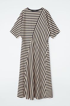 Channeling a modern direction, the monochromatic stripes on this midi dress are in discord. It's cut from cotton-jersey in a slim shape and stitched with an angular seam that allows the fabric to drape effortlessly.  Slim fitRound neck Shell: 100% Cotton. Excluding trims / Machine wash Back length of size S is 48.62" / Model wears a size S Timeless Knitwear, Denim T Shirt, Striped Jersey, Classic Dress, Knitted Tshirt, Poplin Shirt, Blouse And Skirt, Black Midi Dress, Occasion Dresses