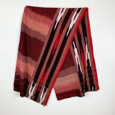 "Beautiful boho true Ikat cloth shawl or wrap in a hand dyed and hand woven abstract design that ends with threads that can be pulled of create fringe. Deep purple and red colors. This wrap was a  souvenir from Indonesia.  Measures: 36\" X 62\" with 2.5\" area that can fringe. Excellent condition no issues. Would be a lovely Mother's Day gift or a cover up for your swimsuit. Sale supports Vermont's PuppeTree. Thank you & please check our Etsy  Support Store." Bohemian Red Pashmina Shawl, Red Bohemian Sarong For Festivals, Red Bohemian Shawl With Fringe, Red Shawl Scarf One Size, Red Bohemian Scarf, Red One Size Shawl Scarf, Traditional Red Shawl, Handwoven Red Bohemian Shawl, Red Handwoven Bohemian Shawl