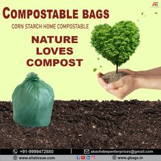 a person holding a tree in their hand next to a bag of compostable bags