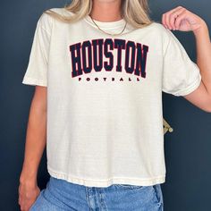 Vintage Houston Football cropped Tshirt Houston Shirt Football T-shirt retro Houston Tee Football Gift Comfort Color Crop Top  -Please check Color and Size Charts before placing the order. You can find them in the listing's photos (Depending on what device you are viewing this listing colors may vary slightly). -Returns and exchanges are accepted only if there are defects "No Extra Costs" We create custom t-shirts with great designs for everyone's liking. If you don't find the size or color you would like, please message us and we will be happy to  accommodate! Vintage Houston Football cropped Tshirt Houston Shirt Football T-shirt retro Houston Tee Football Gift Comfort Color Crop Top  PRODUCT Women's Boxy Tee Comfort Colors® 3023CL 100% ring-spun US cotton Heavy fabric (6.1 oz/yd² (206.8 Short Sleeve Cropped T-shirt With Letter Print For College, Cropped Short Sleeve Letter Print T-shirt For College, Cropped Short Sleeve T-shirt With Letter Print For College, Cropped Letter Print T-shirt For College, Retro White Cropped T-shirt With Letter Print, Cropped Tshirt, Football Gift, Colorful Crop Tops, Shirt Football