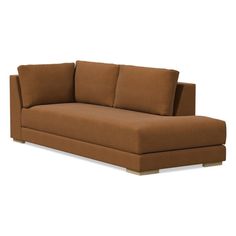 a brown couch sitting on top of a white floor